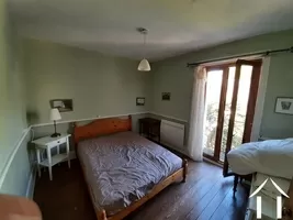 Bedroom with access to a balcony